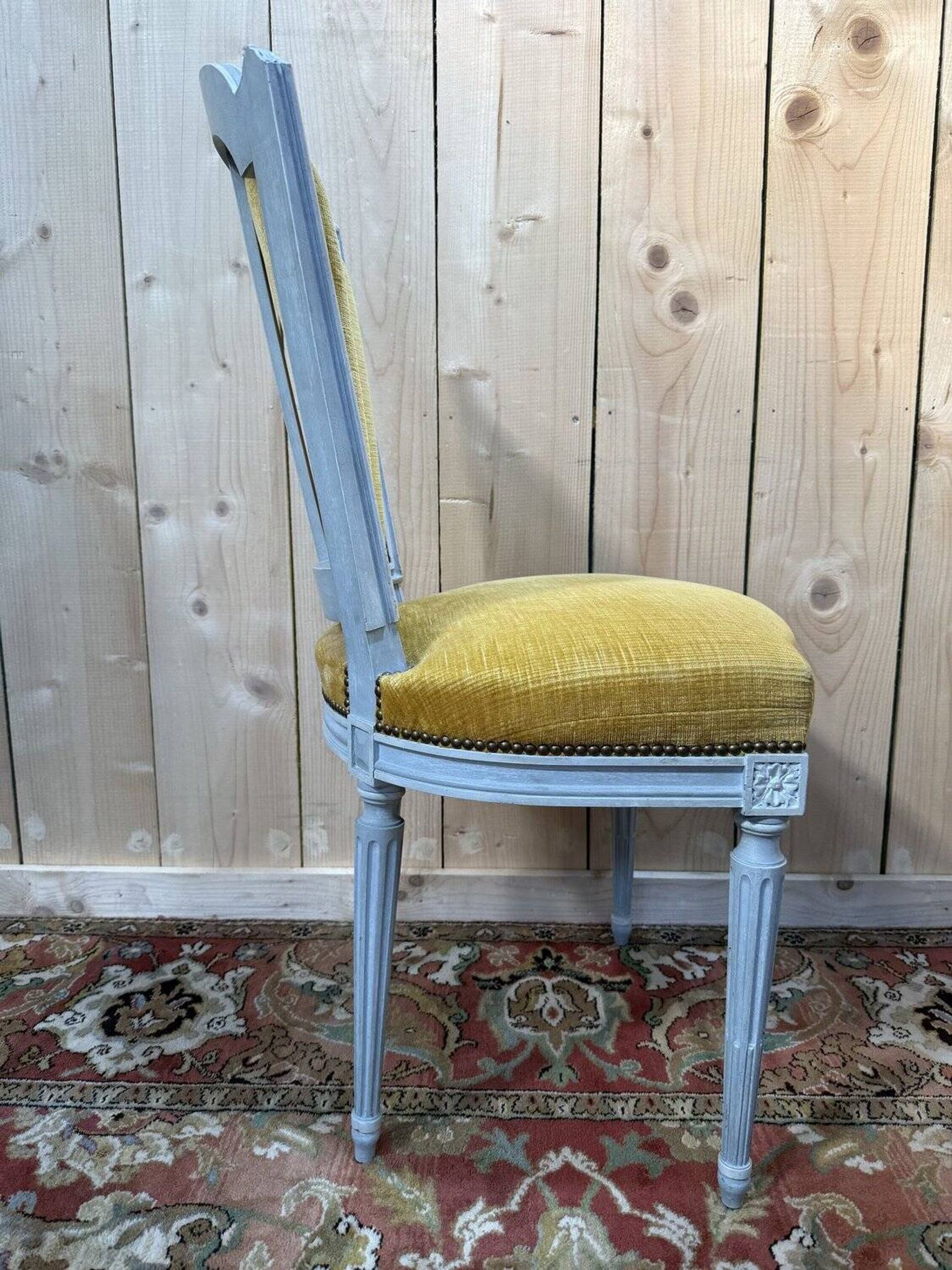Set of 6 Louis XVI style chairs with polished wood and velvet.