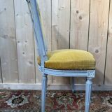 Set of 6 Louis XVI style chairs with polished wood and velvet.