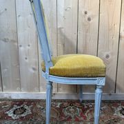 Set of 6 Louis XVI style chairs with polished wood and velvet.