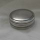 Small round silver metal box SNPA.