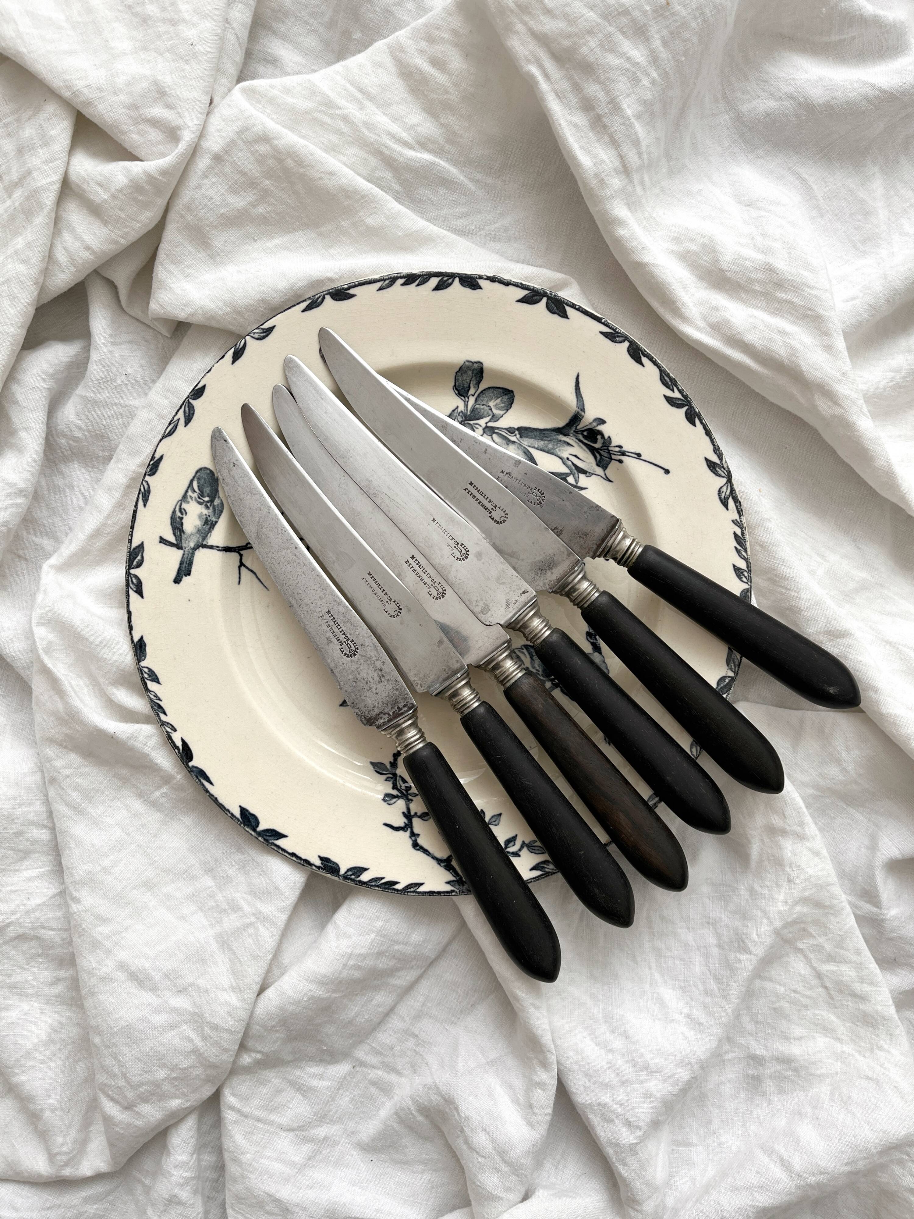 6 antique black wooden table knives La Trompette, late 19th century