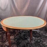 A Louis XVI period mahogany half-moon table forming a console/games table