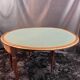 A Louis XVI period mahogany half-moon table forming a console/games table