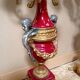 Pair of six-light candelabra in patinated and gilded bronze and spelter.