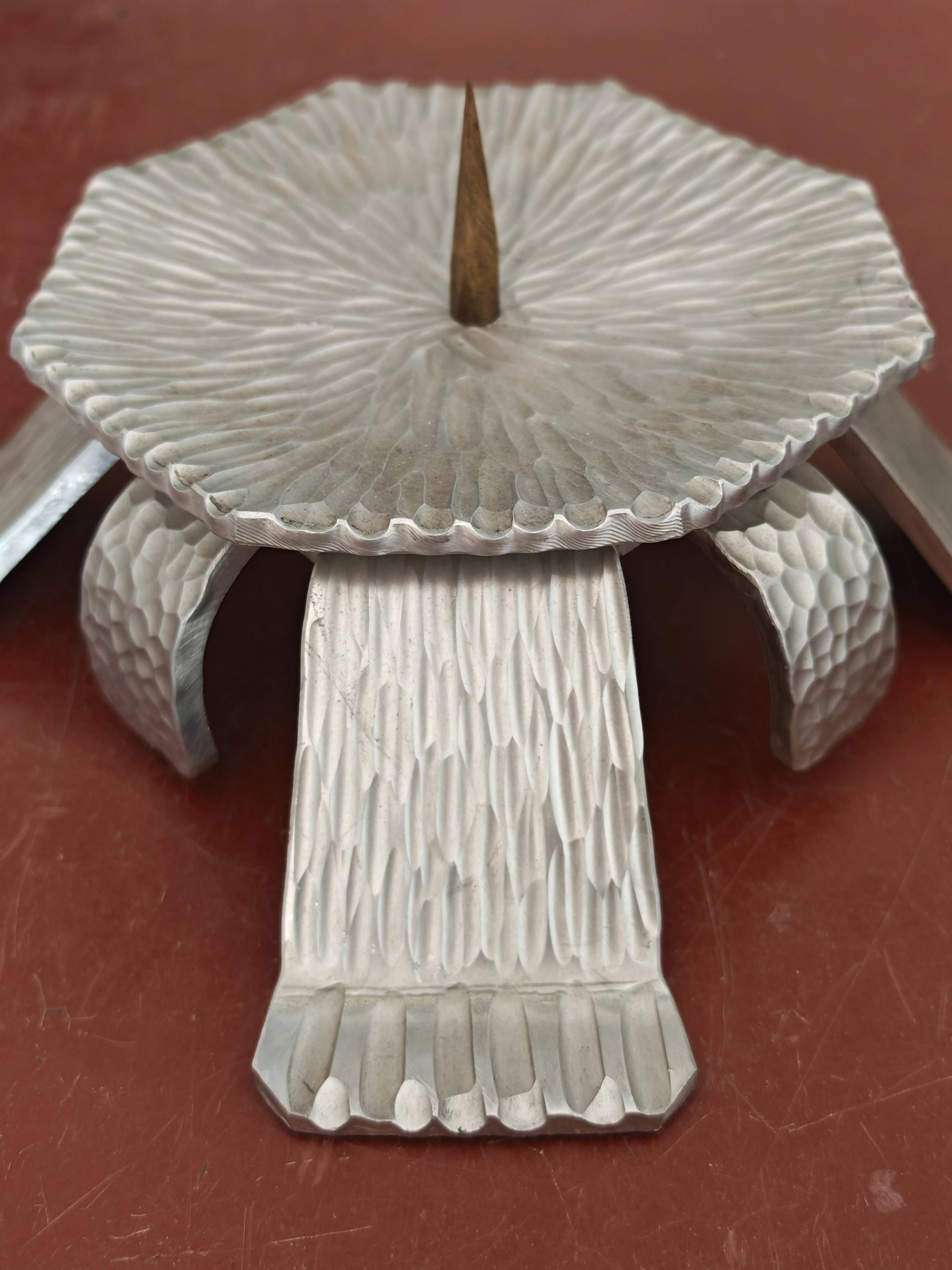 Pair of brutalist hammered aluminium candlesticks, 1970s