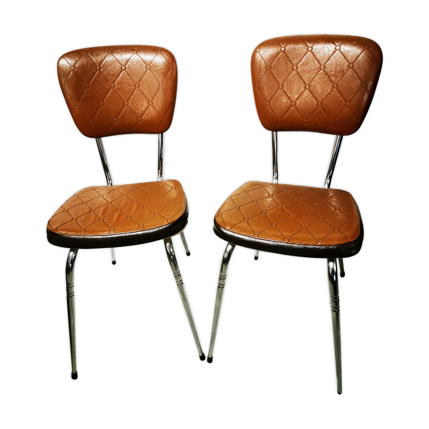 Pair of chrome and skai chairs