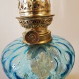 Large kerosene lamp mounted on bronze statue. Late nineteenth century