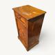Small rustic antique bedside table made of solid wood.