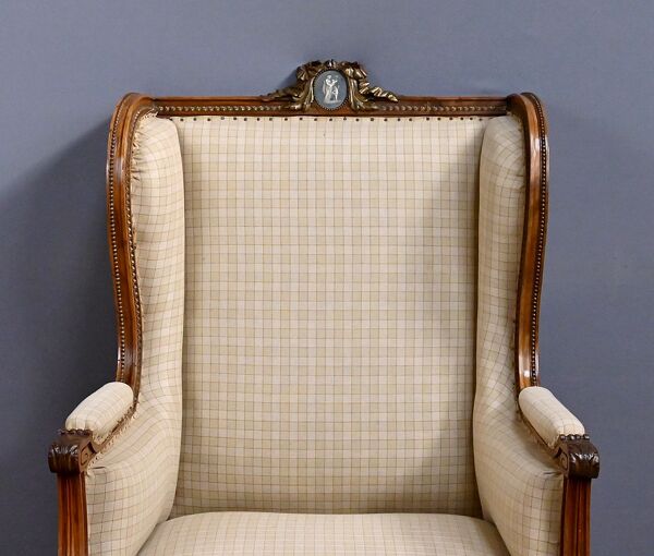 Fauteuil bergère à oreilles en noyer, style Louis XVI – fin XIXe