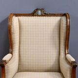 Wingback armchair in walnut, Louis XVI style – late 19th century