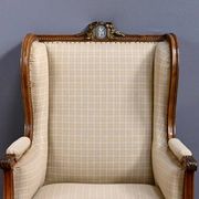 Wingback armchair in walnut, Louis XVI style – late 19th century