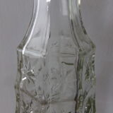 Chiseled glass bottle