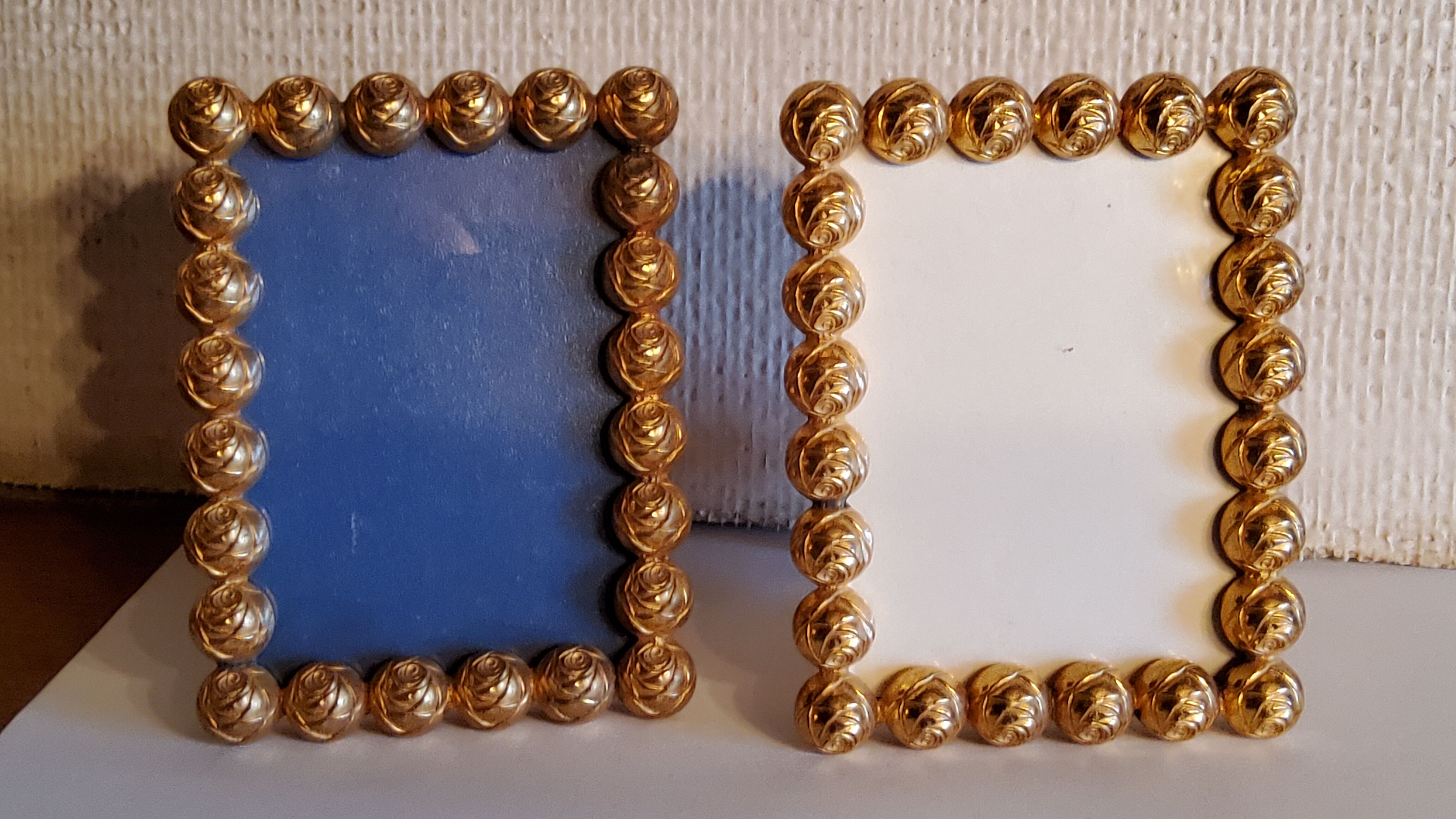 Pair of art deco photo frames in gilded bronze and gilded brass