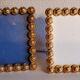 Pair of art deco photo frames in gilded bronze and gilded brass