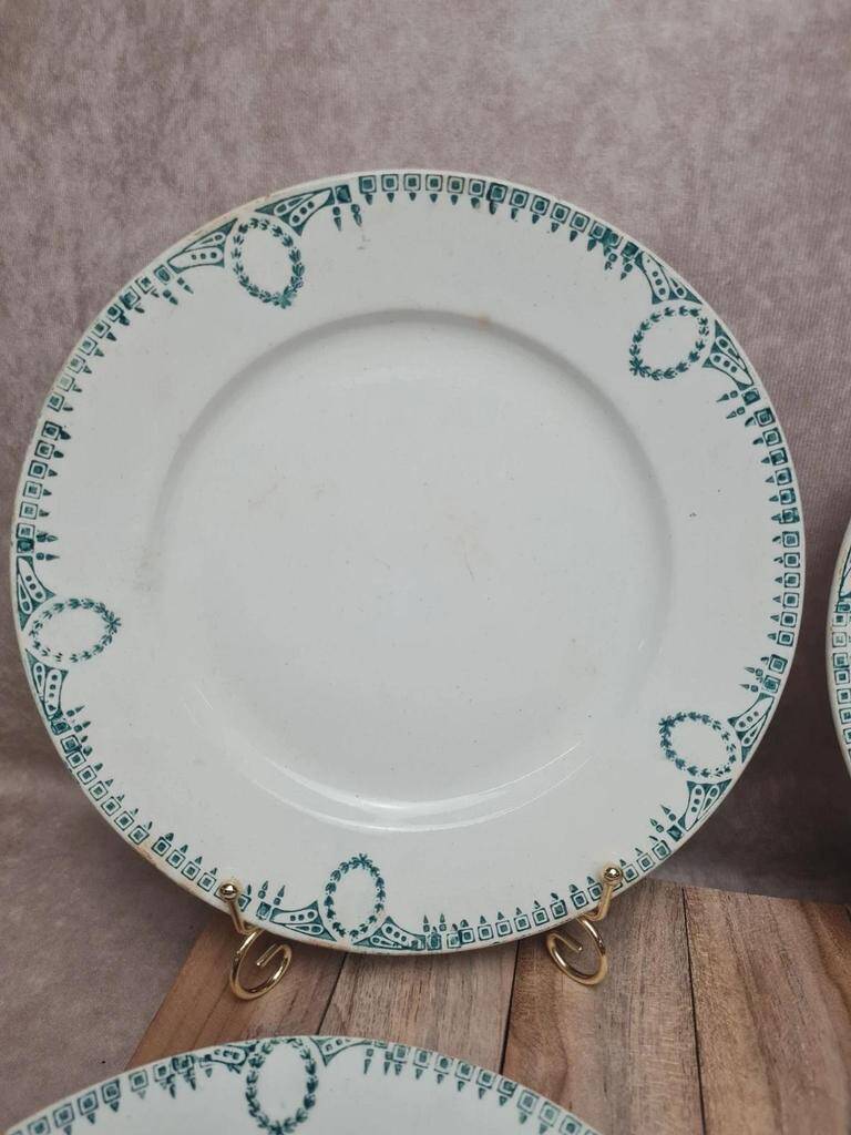 Set of 4 antique plates, Terre de fer Saint-Amand, green decoration.