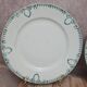 Set of 4 antique plates, Terre de fer Saint-Amand, green decoration.