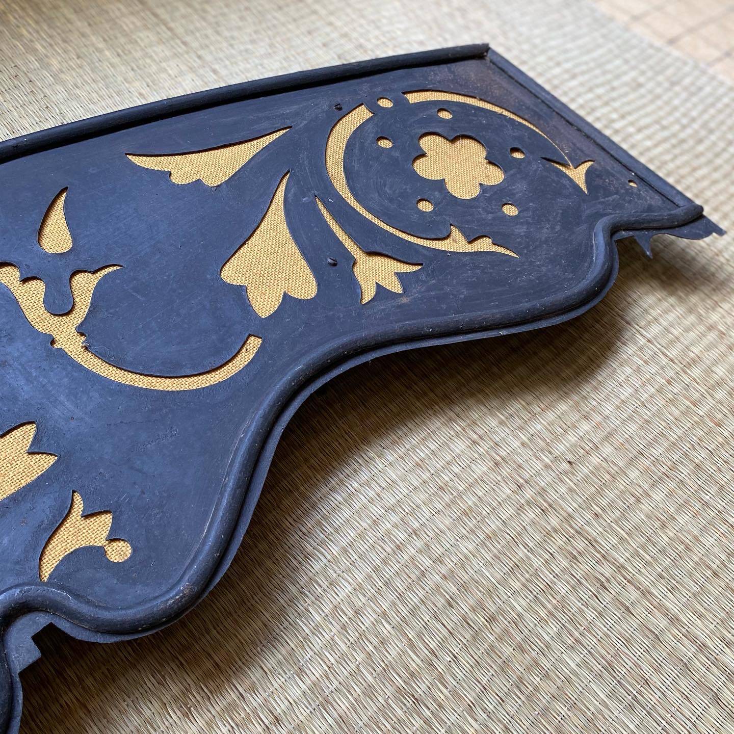 Taxes / wrought iron pediment