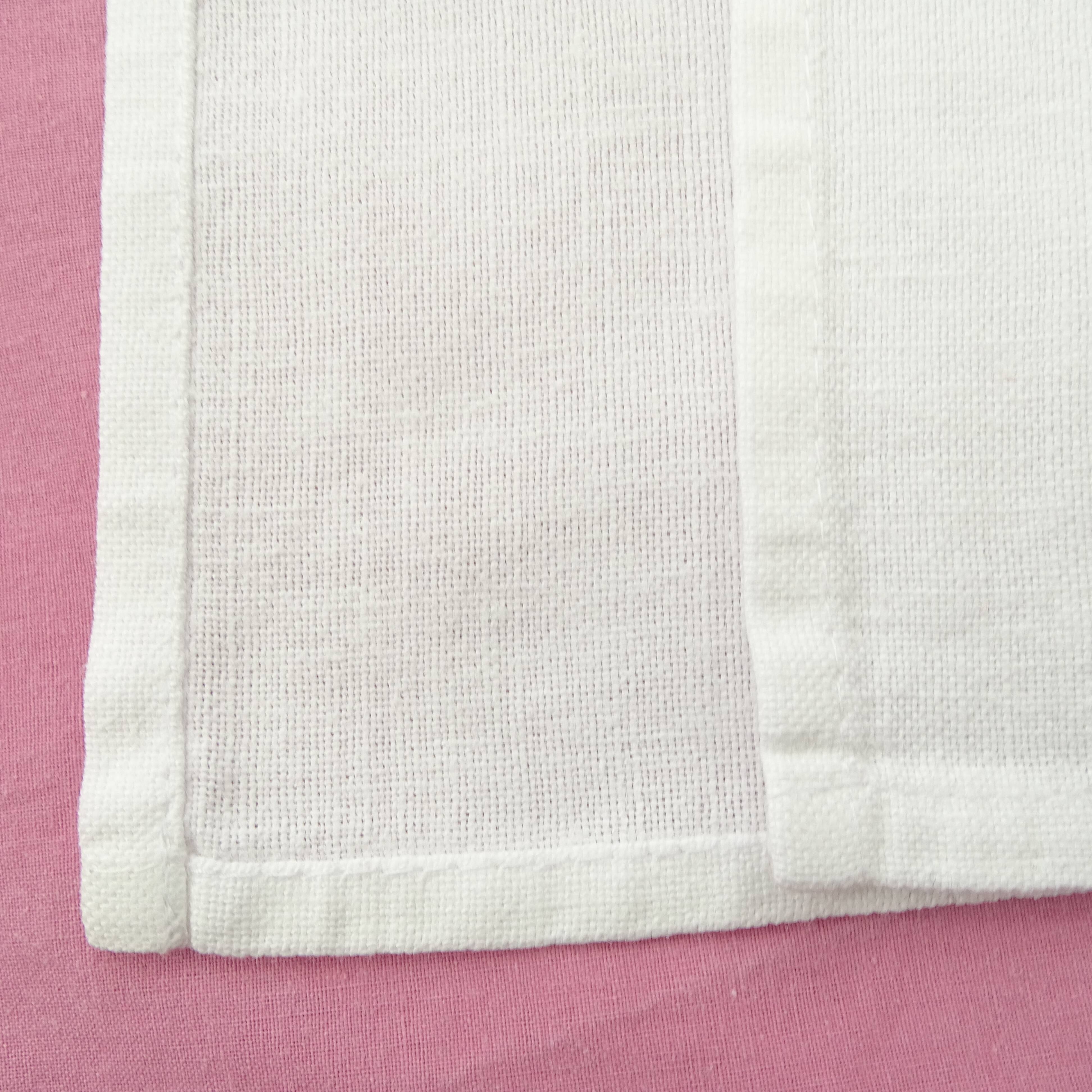 Set of 11 cotton napkins.
