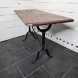 Table de bistrot pieds en fonte dessus en bois massif