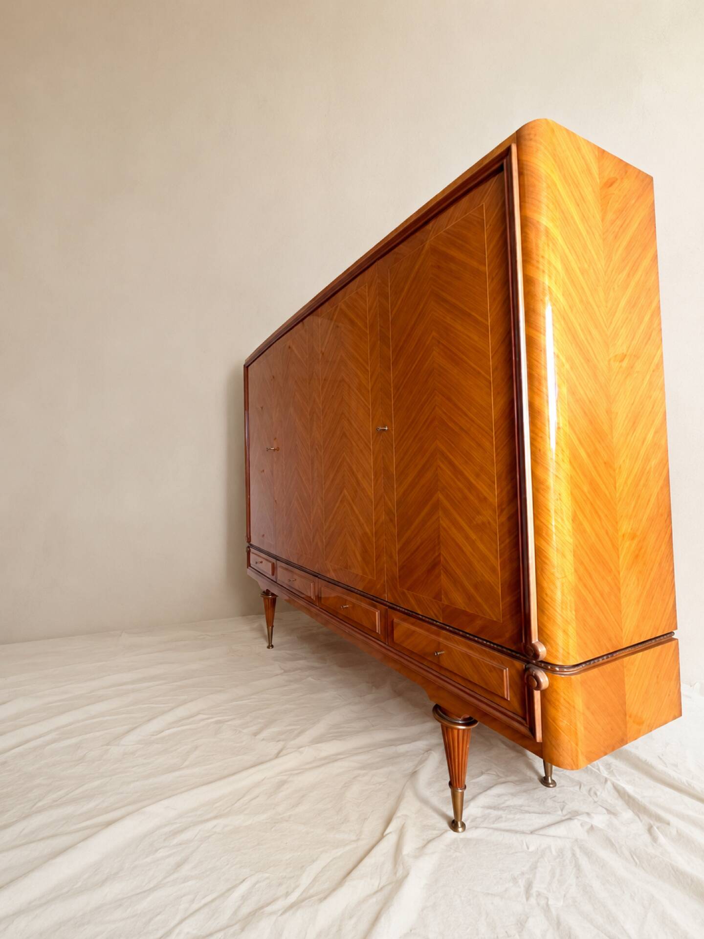 Vintage 4-door chevron wood wardrobe with mirror and gold legs.