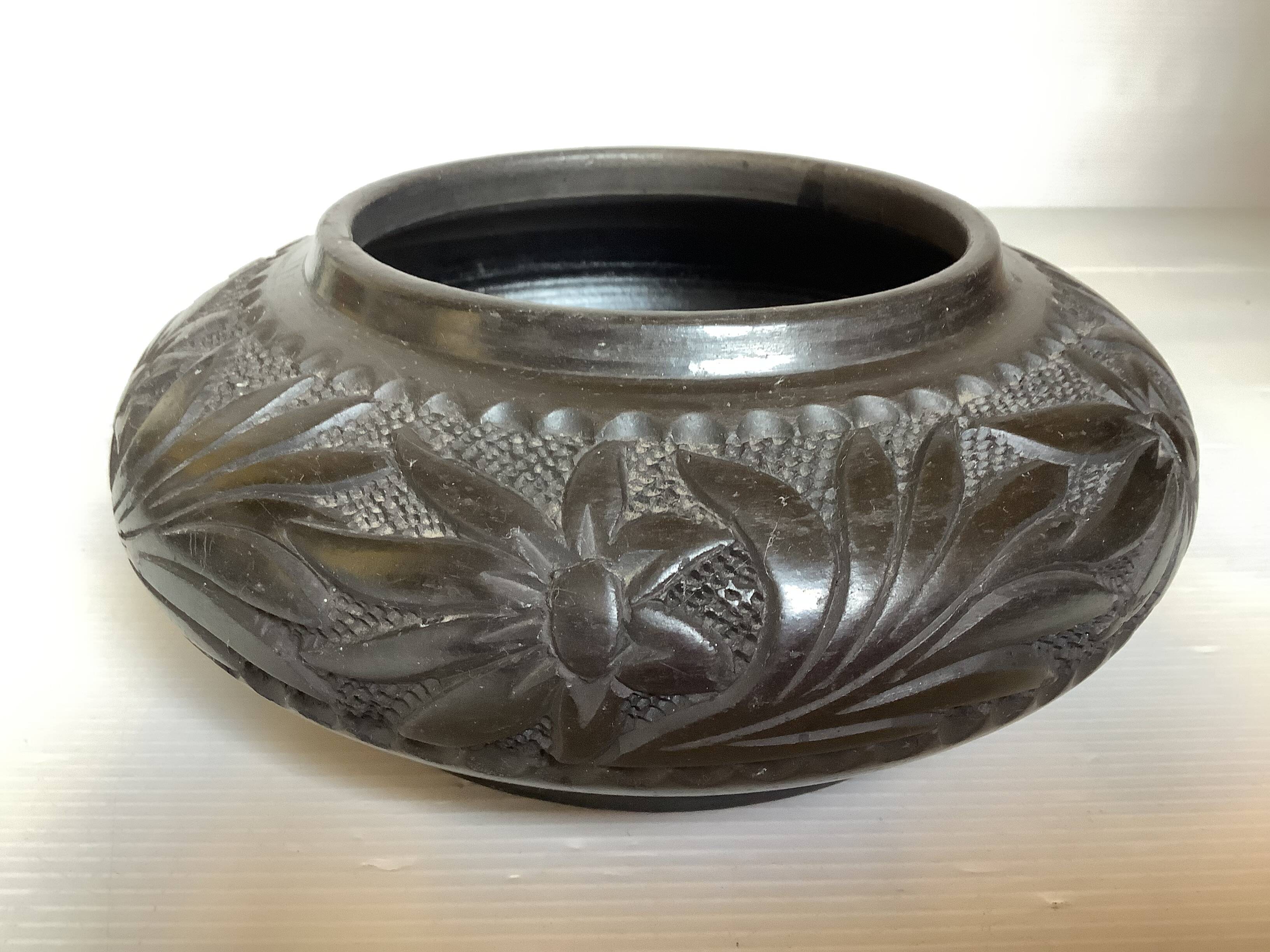 Black pottery catchall worked from Marginea, Romania.