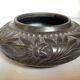 Black pottery catchall worked from Marginea, Romania.