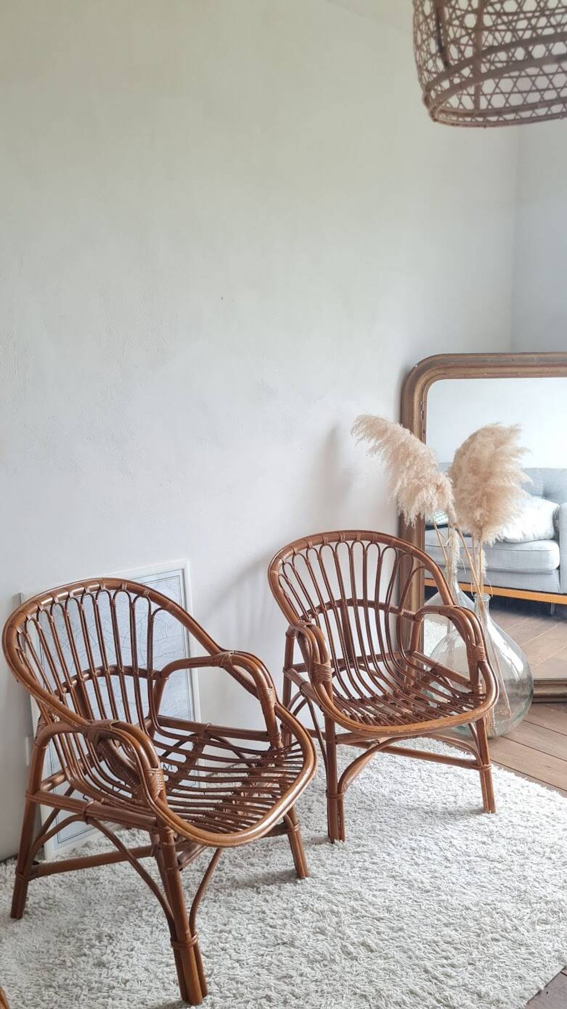Paire de fauteuils en rotin vintage circa années 70
