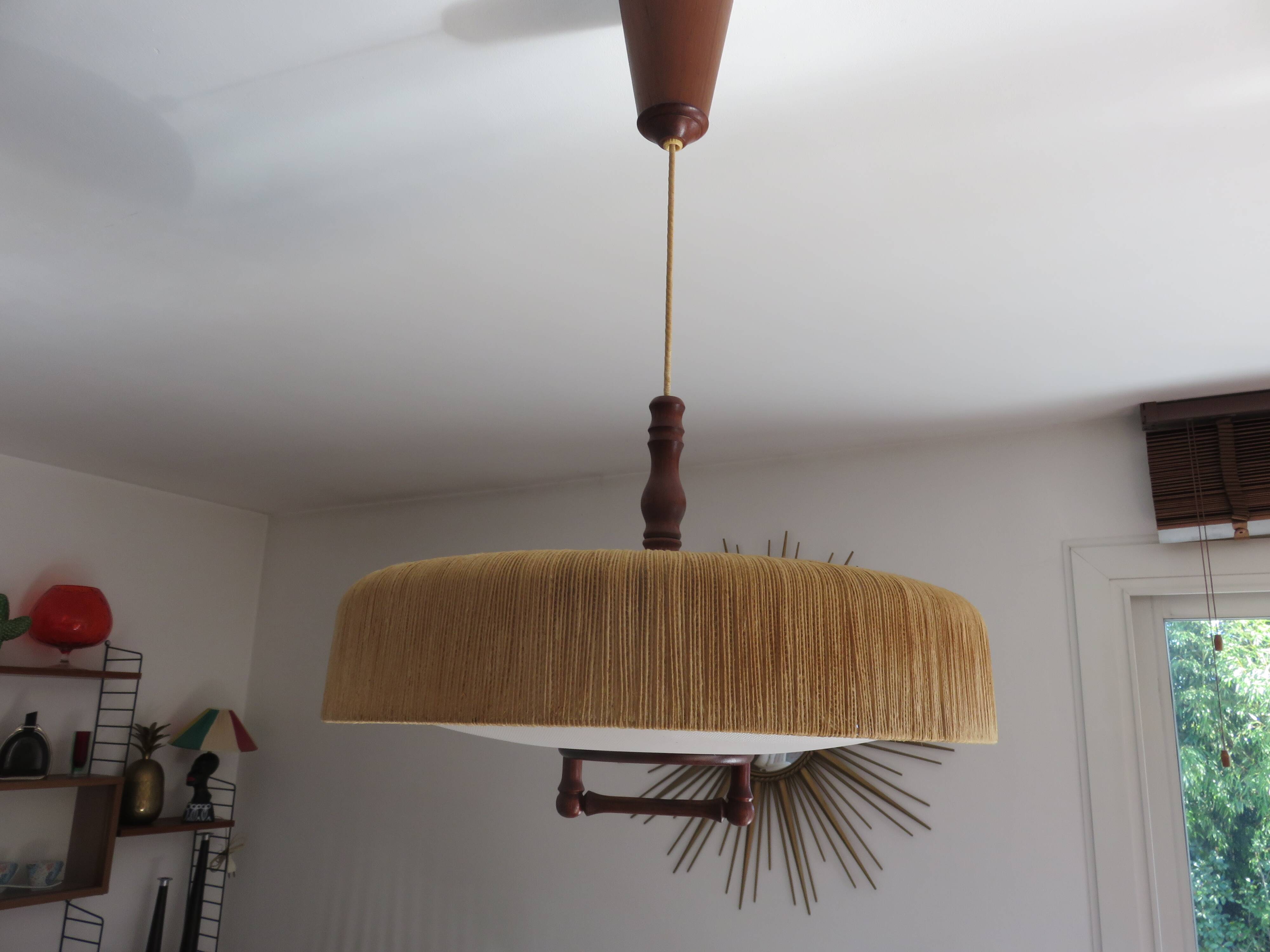 Suspension made of sisal and teak around 1960.