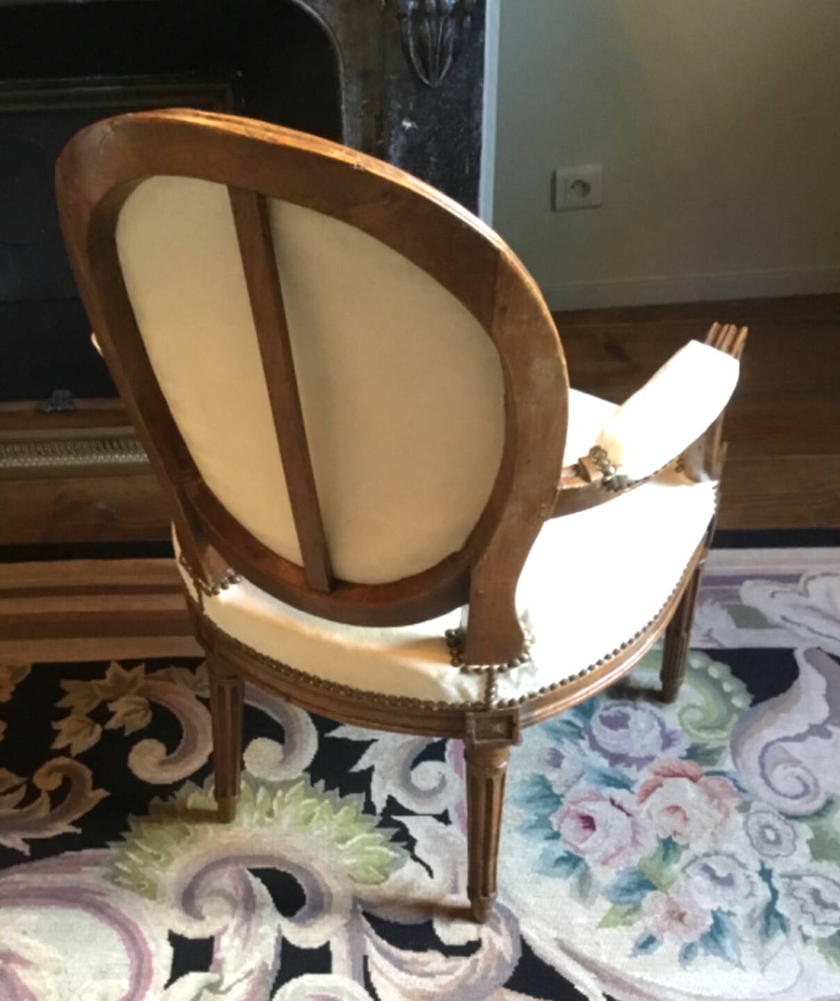 Louis XVI period cabriolet armchair with medallion back