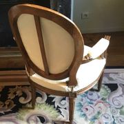 Louis XVI period cabriolet armchair with medallion back