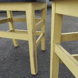 Pair of wooden and yellow formica chairs