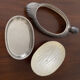 Serving dish with bell in silver metal shape duck