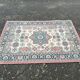 Vintage oriental rug in burgundy red, 133x196cm.