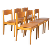 Set of 6 Danish dining chairs made of beech and brown leatherette.