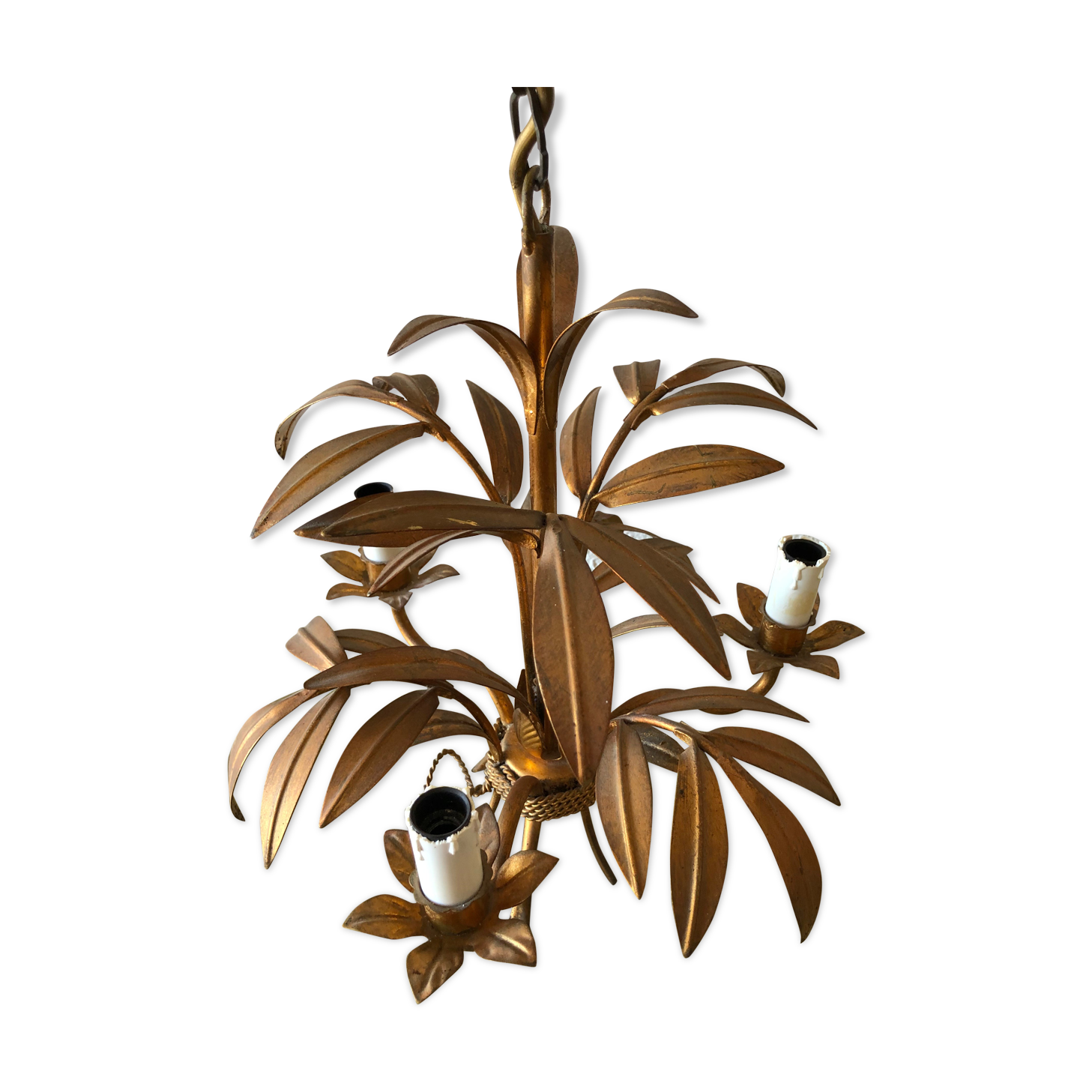 Golden vintage chandelier with leaf decoration