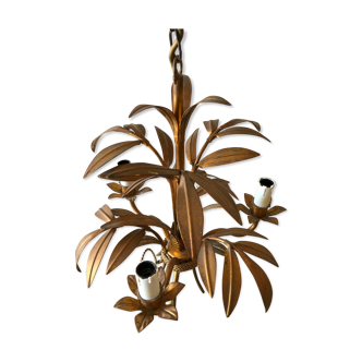 Golden vintage chandelier with leaf decoration