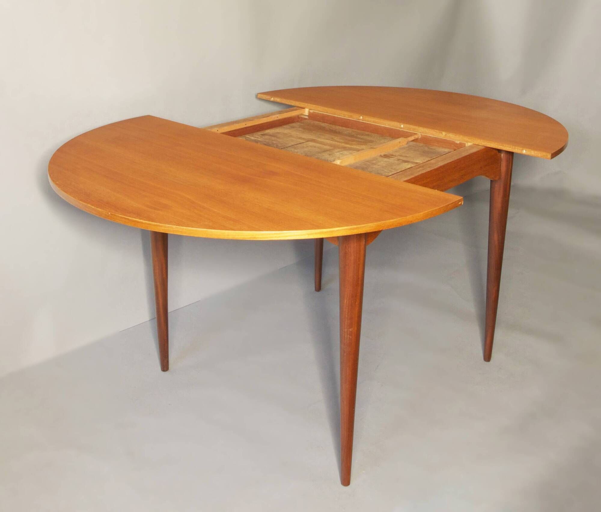 Italian circular teak extendable dining table, 1960s