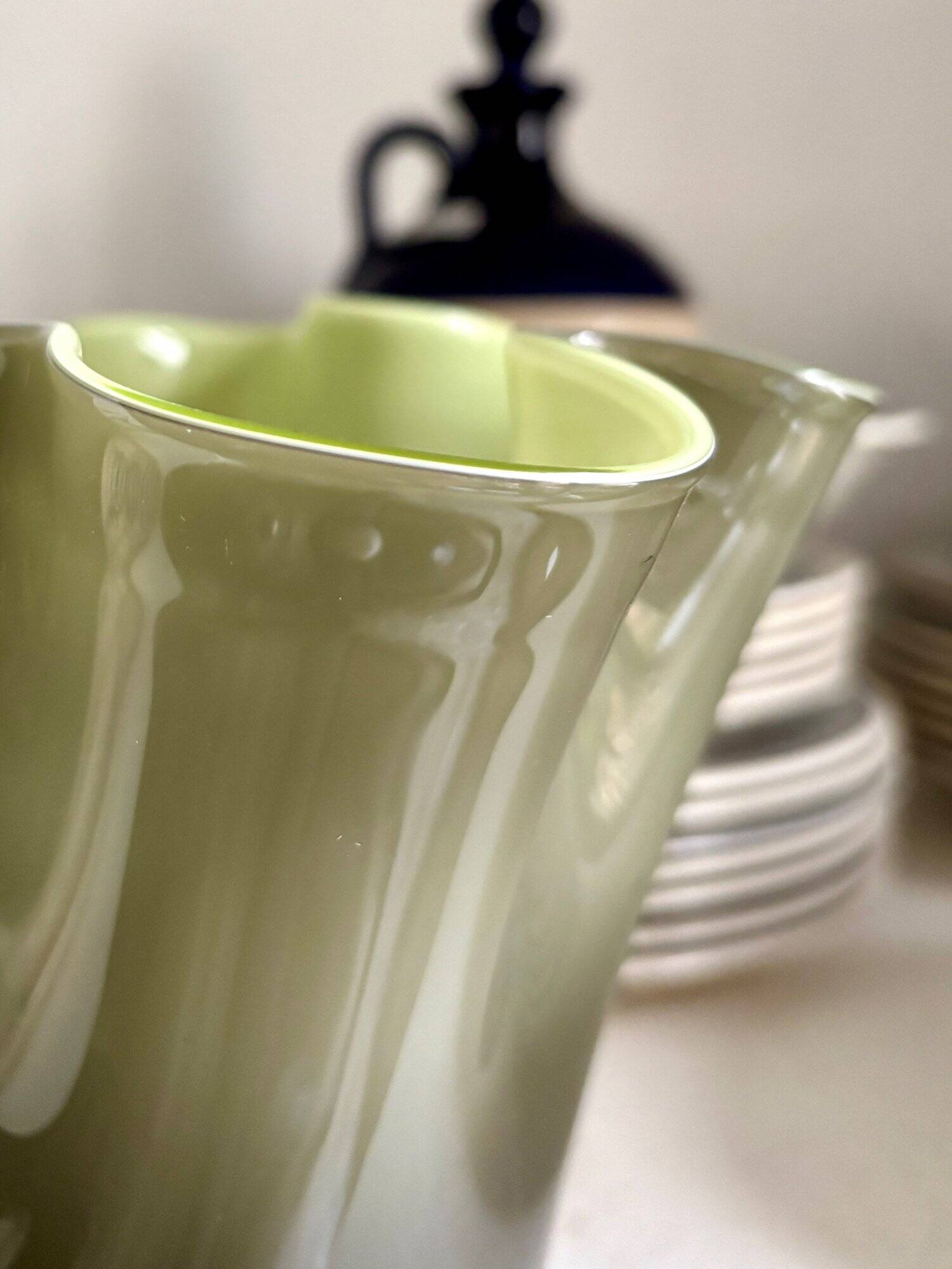 Green blown glass handkerchief vase