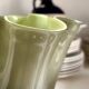 Green blown glass handkerchief vase