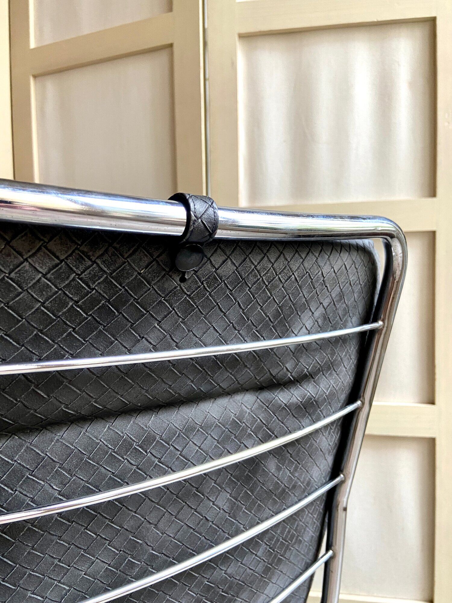 2 chairs in chromed metal and black woven skaï 1970s