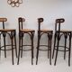 4 curved wood and cane bar stools