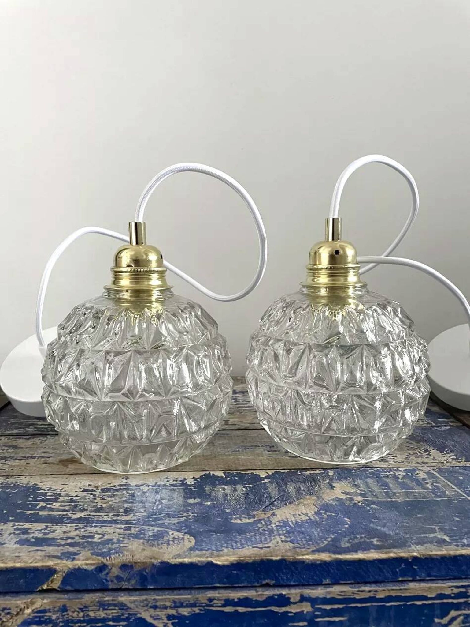 Set of two chiseled glass pendant lights