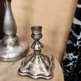 Set of three silver candle holders