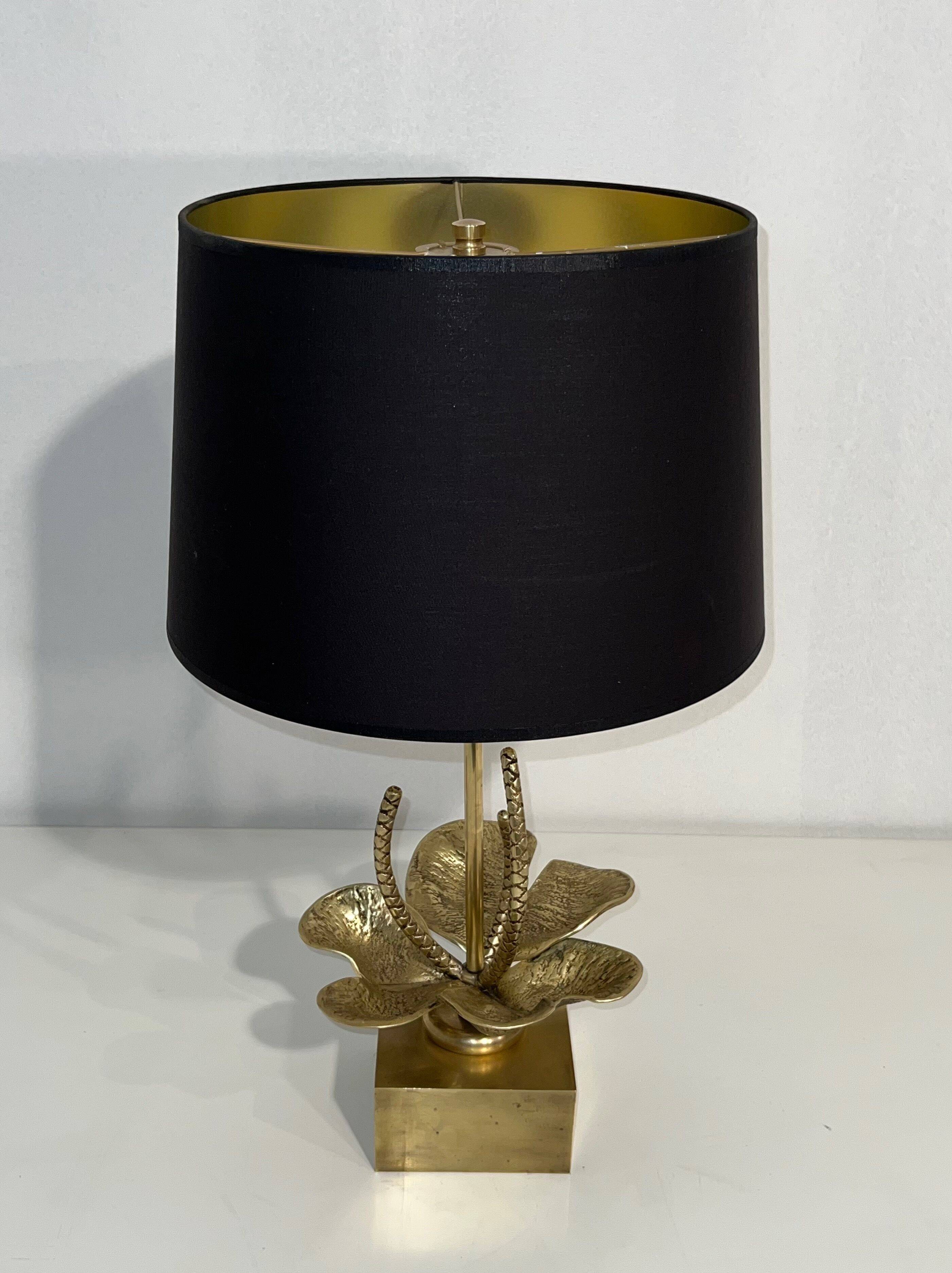 Bronze and brass lily pad lamp attributed to Maison Charles. Circa 1970.
