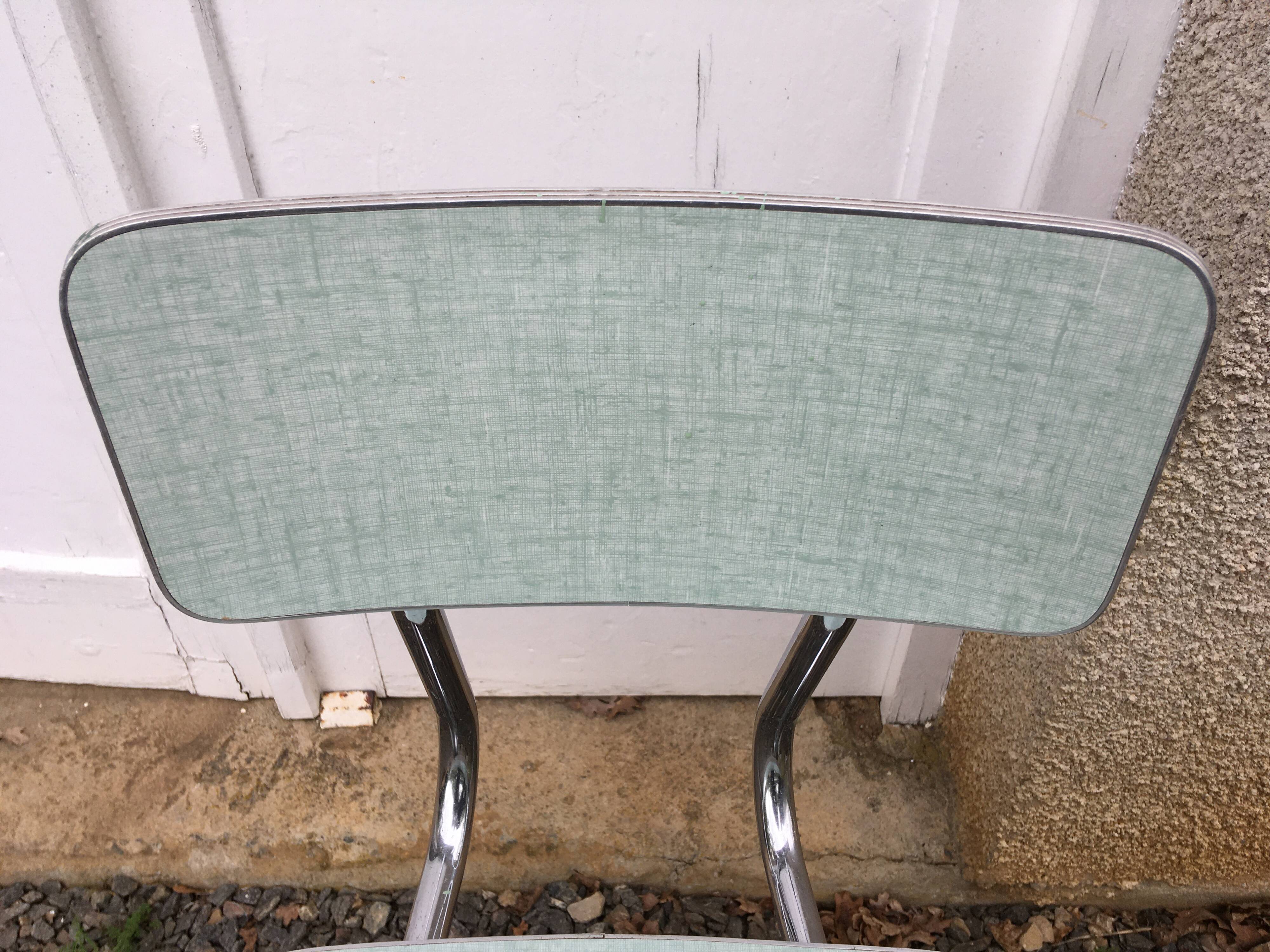 Formica table set with extensions + 4 Plastilux chairs