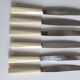 Set de 6 couteaux en inox et bakélite