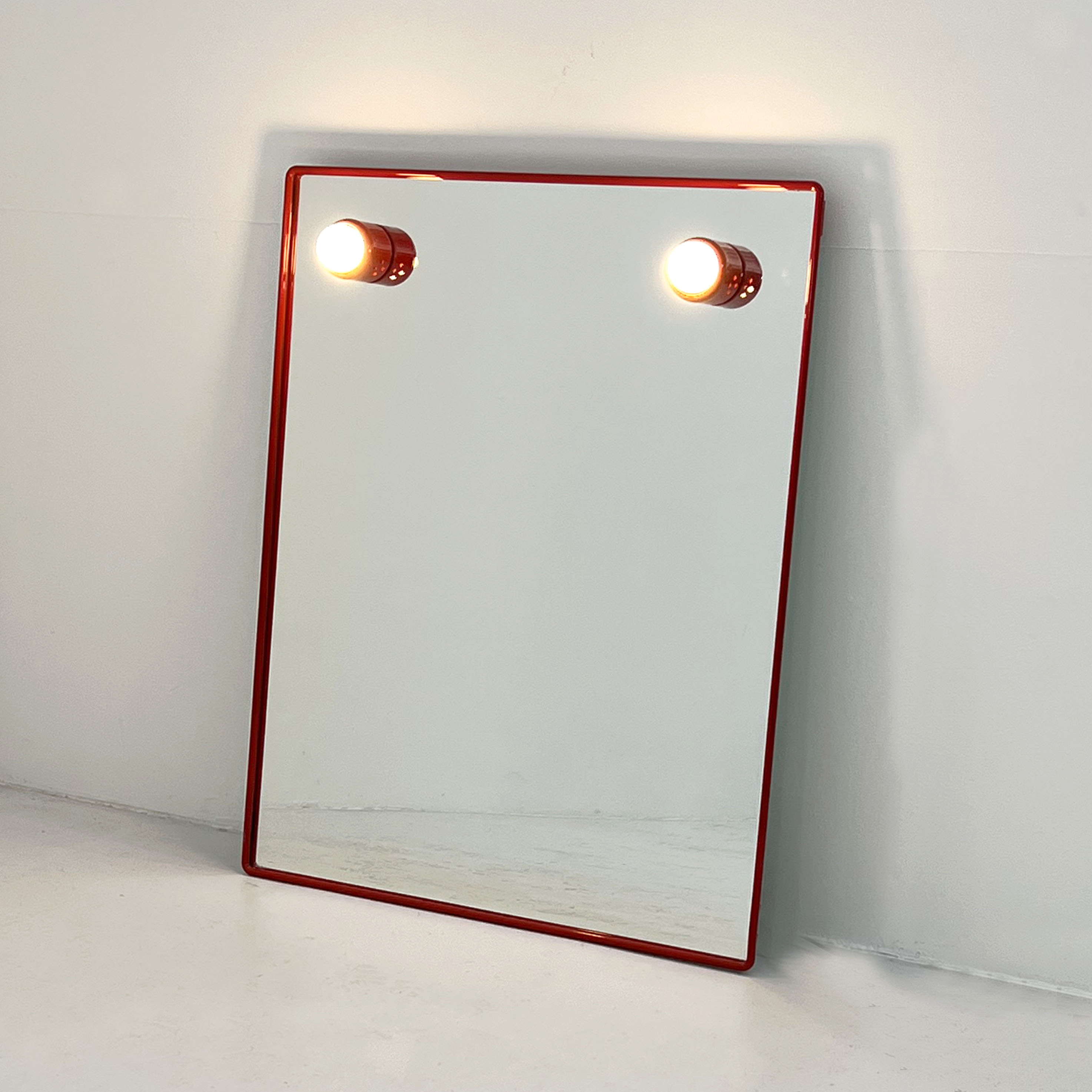 Mirror with red metal bulbs, 1970