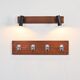 Wall coat rack and lights by Pierre Guariche for La Plagne, around 1968.