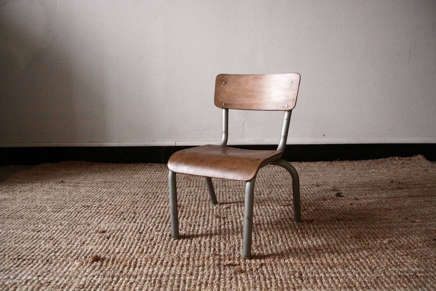 Old school chair in wood and metal
