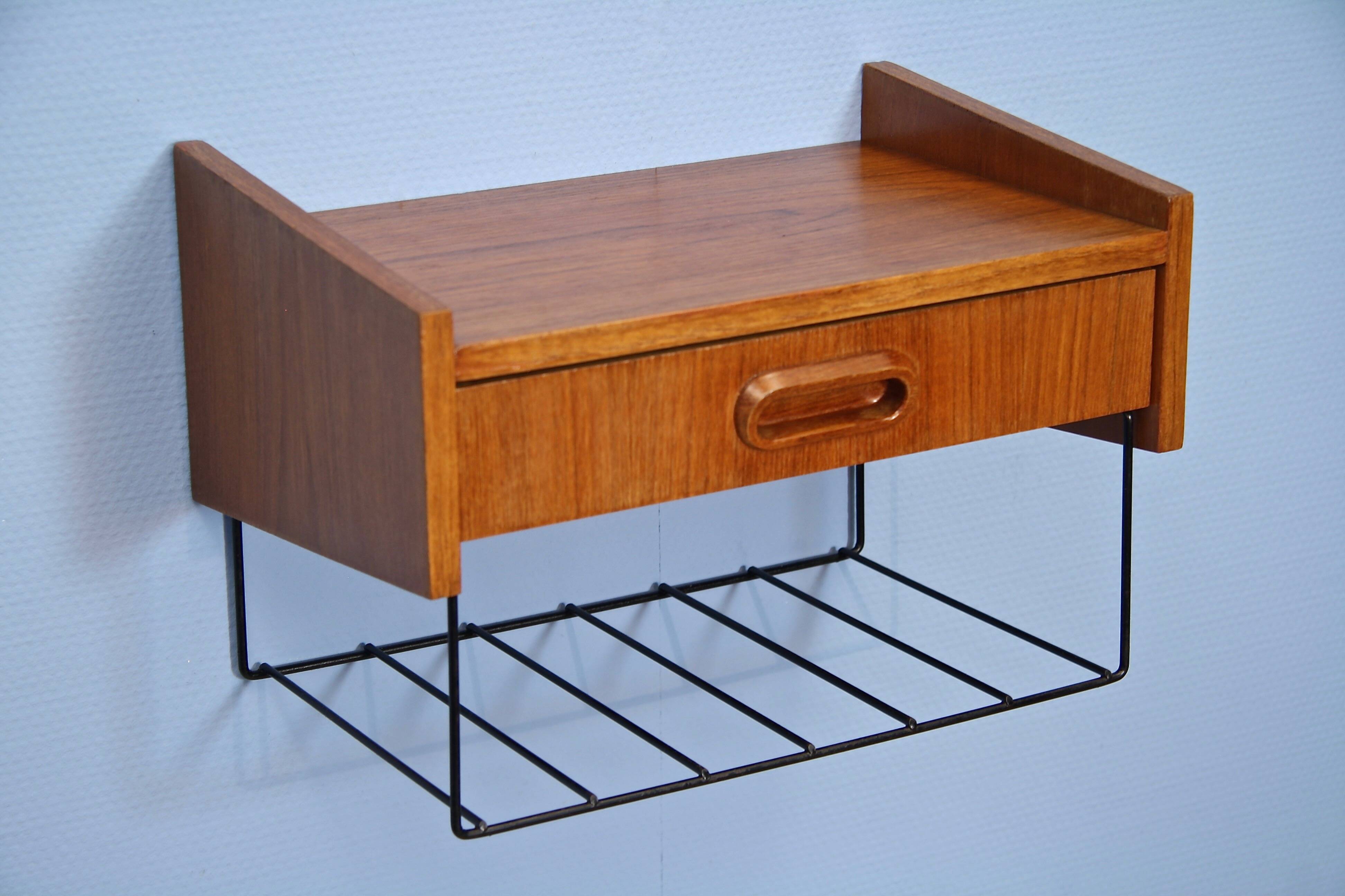 Dutch wall shelf by Tomado in teak and metal, 1960s.